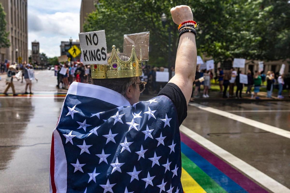 Protesters gather in downtown Lexington, Ky., during the “No Kings” protest on Saturday, June 14, 2025.