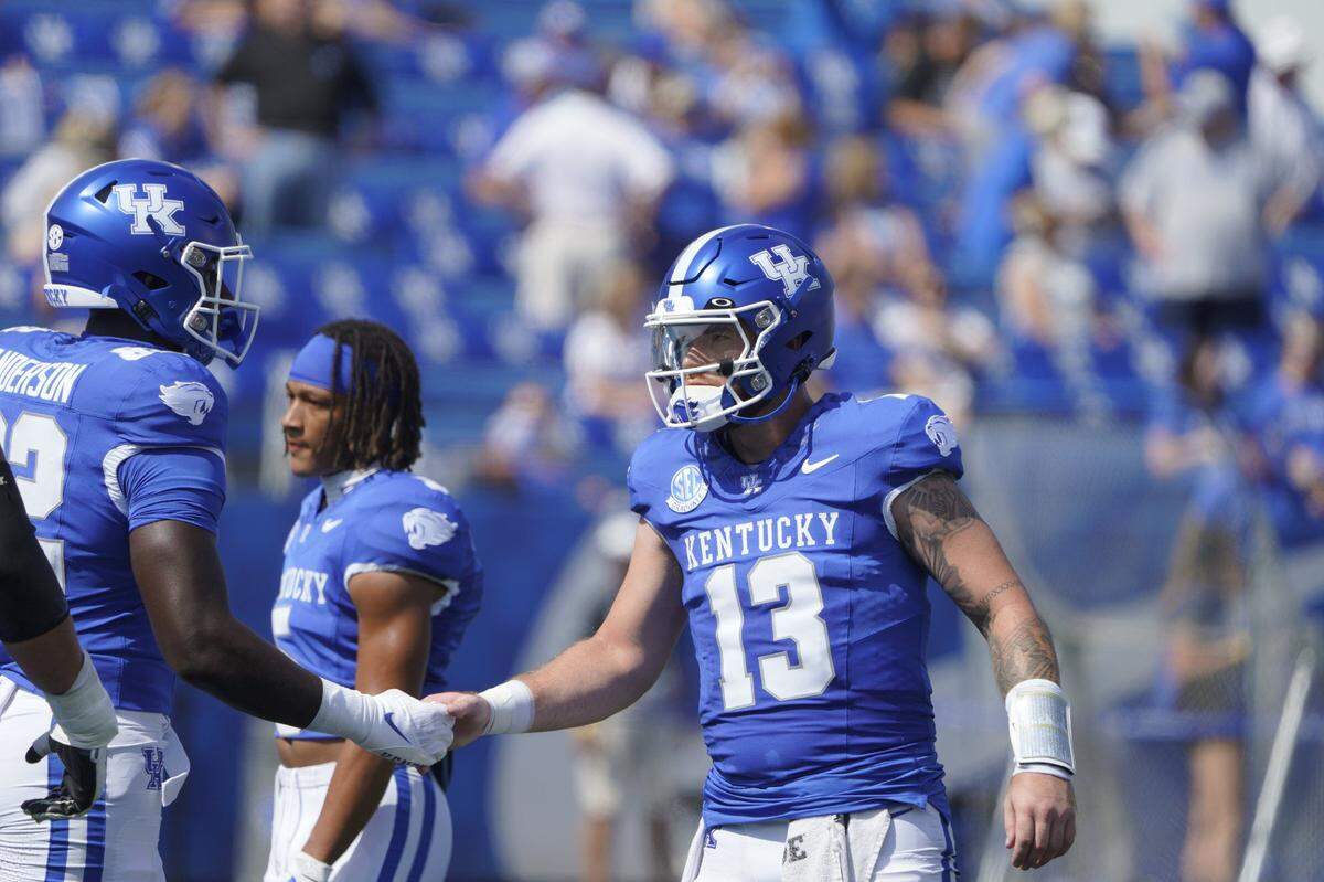 Kentucky quarterback Devin Leary (13) played in his first game as a Wildcat on Saturday against Ball State.