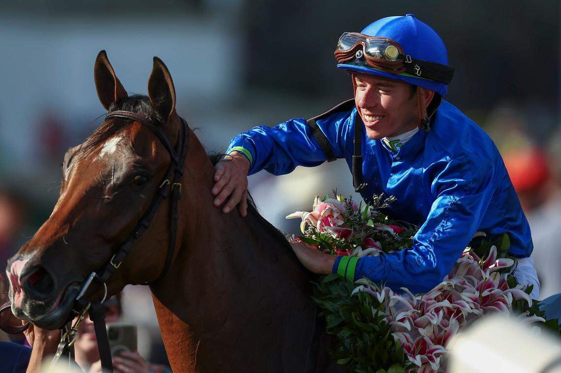 Pretty Mischievous, with Tyler Gaffalione up, celebrate their win in the 149th Kentucky Oaks at Churchill Downs on Friday.