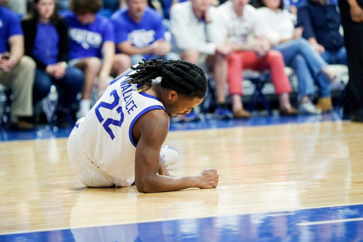 Kentucky guard Cason Wallace (22) missed the final 18:09 of UK’s 68-66 Senior Night loss to Vanderbilt at Rupp Arena after suffering an apparent leg injury.