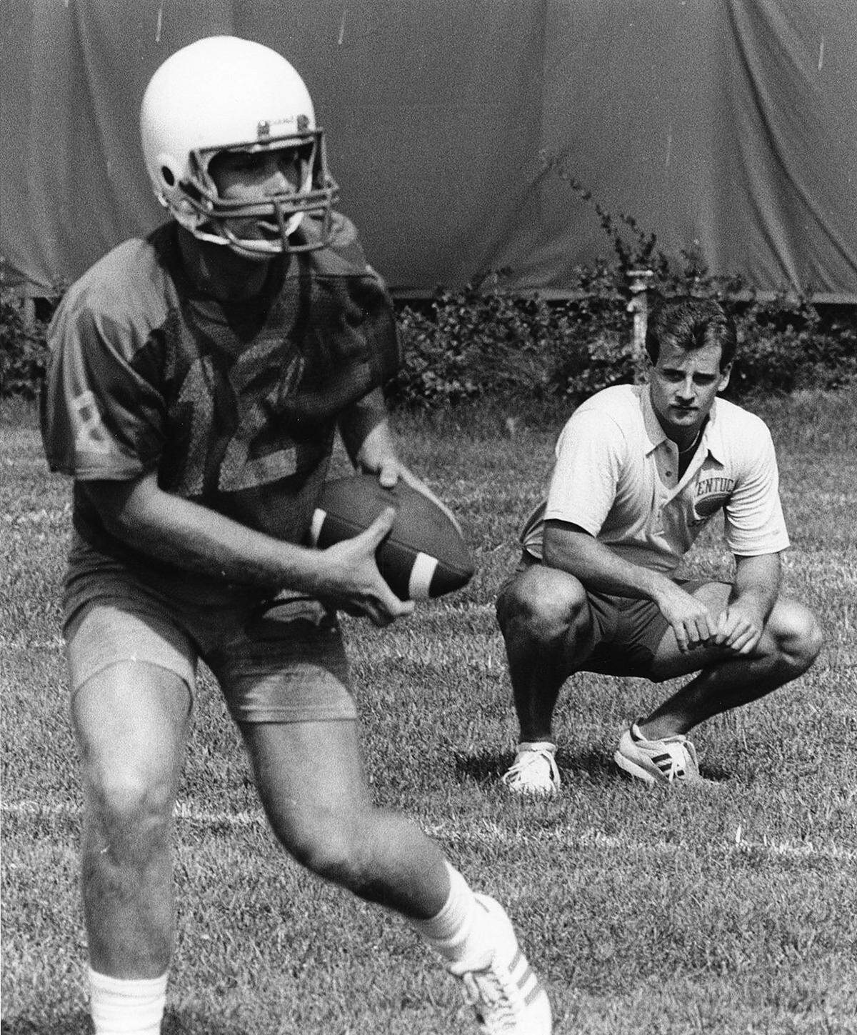 Bill Allen (12) threw 13 passes, completing seven, during his four-year career (1985-88) as a Kentucky Wildcats backup quarterback.
