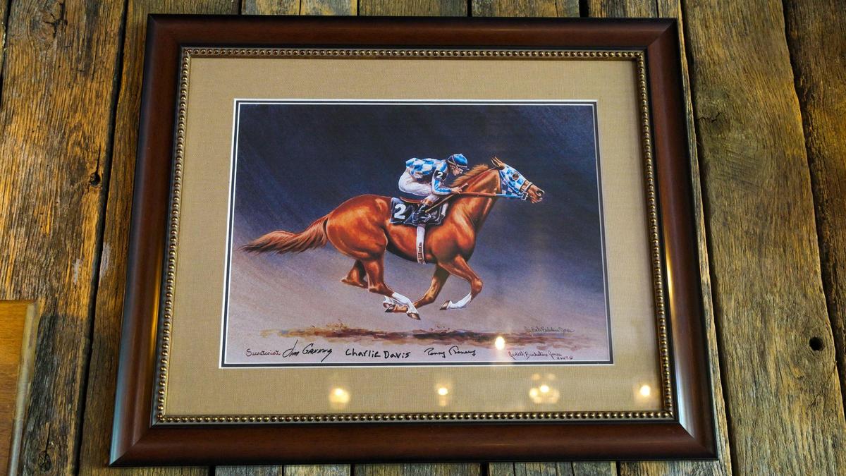 Secretariat memorabilia dot the interior of Golden’s Pub & Deli in Georgetown.