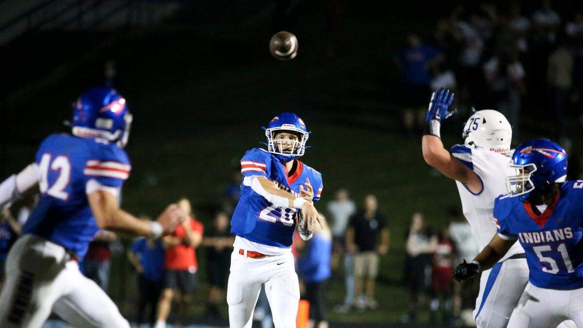 Hagan Harrison (20) completes a pass during Madison Central’s game-winning drive. Harrison threw three touchdown passes Friday night.