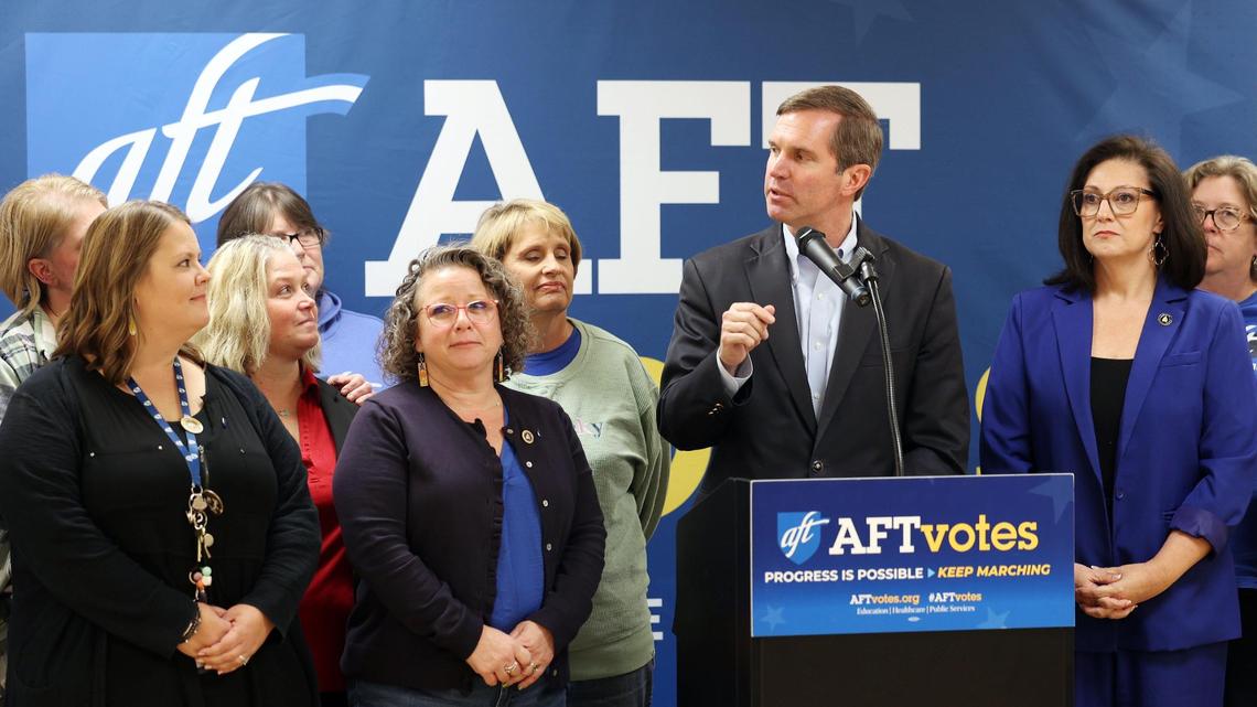 Gov. Andy Beshear, center, speaks out against Amendment 2 while surrounded by educators at Consolidated Baptist Church in Lexington, Ky., Tuesday, Oct. 15, 2024. (Photo by James Crisp)