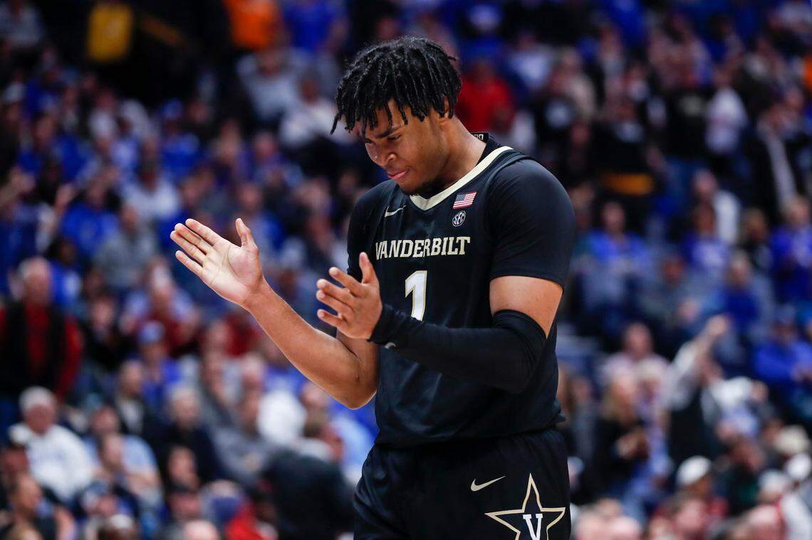 Vanderbilt forward Colin Smith celebrates after drawing a foul against Kentucky during the SEC Tournament quarterfinals at Bridgestone Arena in Nashville.