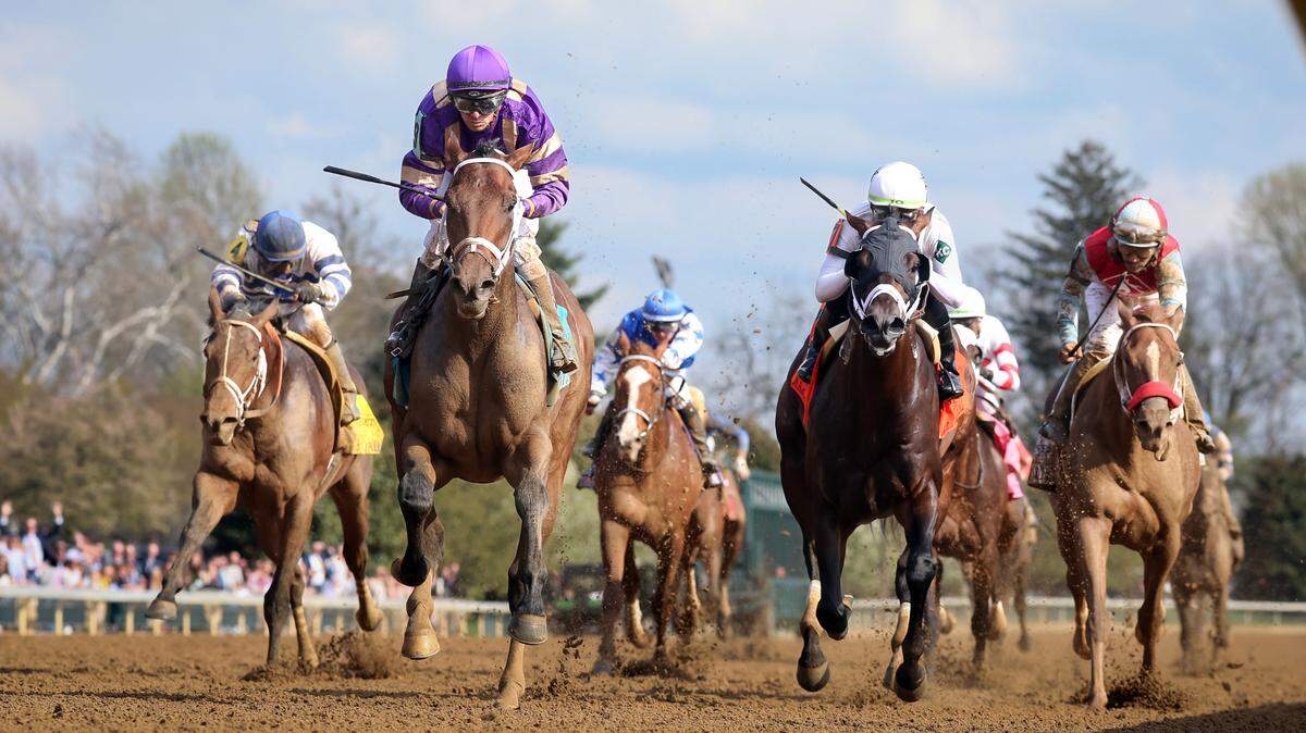 Tawny Port, with Florent Geroux up, wins the Stonestreet Lexington for trainer Brad Cox and owner John Fort.