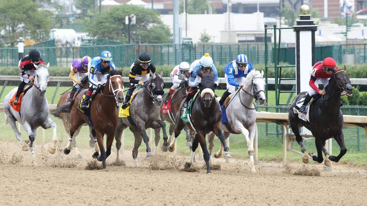 Miguel Mena guided Tom’s d’Etat, center, to victory in the Stephen Foster at Churchill Downs on Saturday, June 28, 2020.