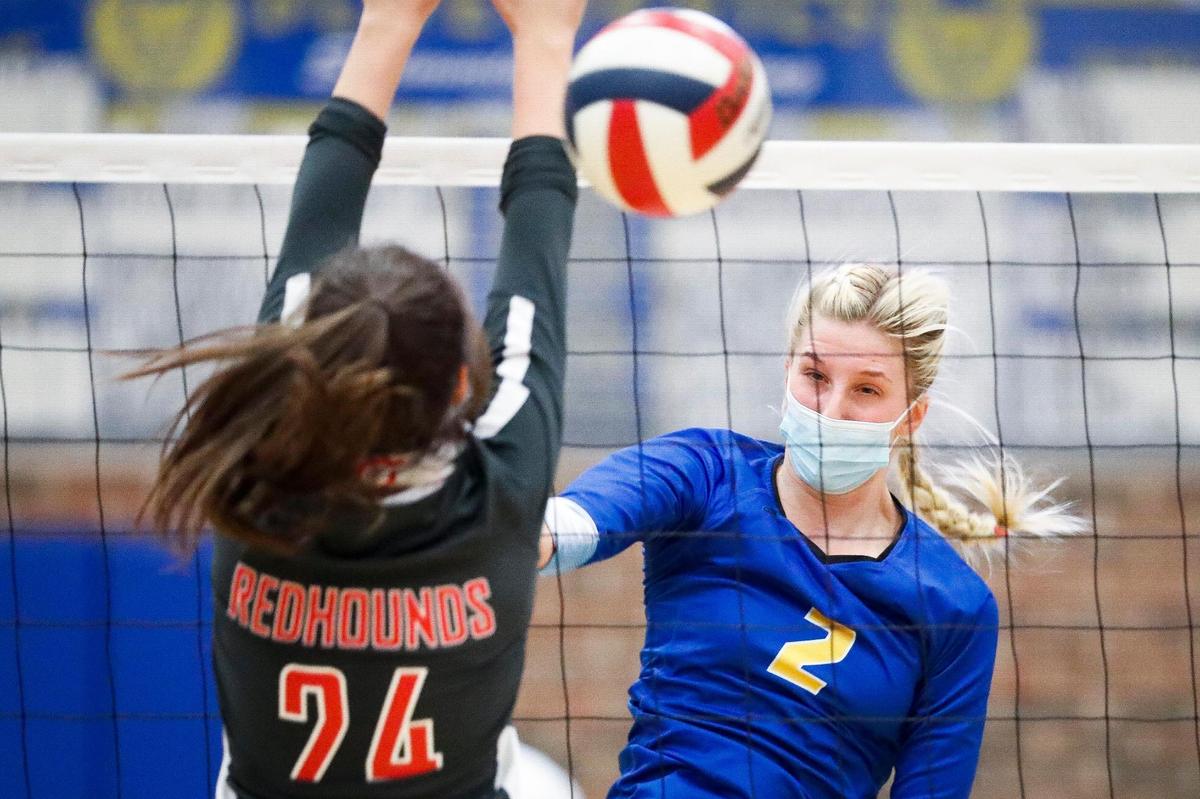 Henry Clay’s Emma Shadwick (2) hit the ball past Corbin’s Cara Whitus (24) during their first-round state tournament matchup at Henry Clay on Monday. Henry Clay advanced with a 3-0 win.