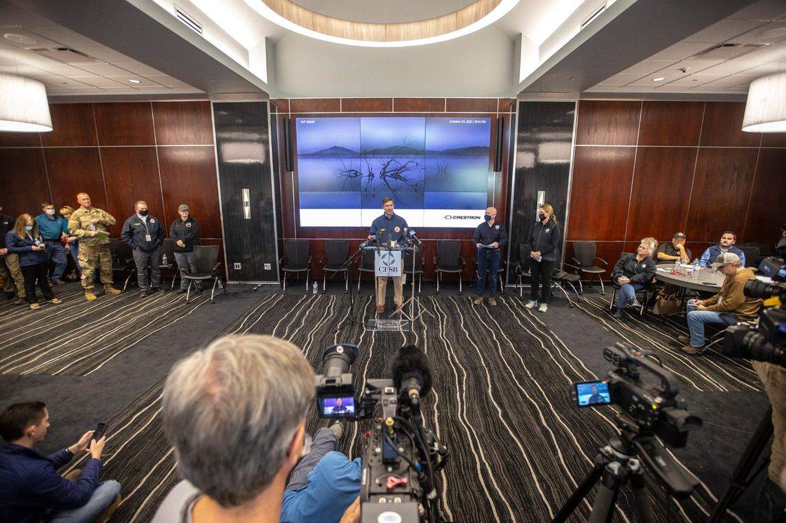 Kentucky Gov. Andy Beshear speaks during a media conference at the Graves County Emergency Operations Center in Mayfield, Ky., on Sunday, Dec. 12, 2021.