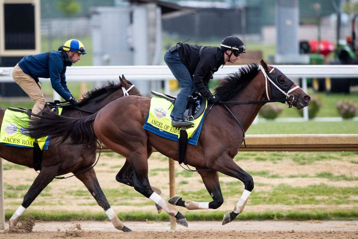 Angel of Empire, with exercise jockey Edvin Vargas, works in company with Jace’s Road, during morning training at Churchill Downs this past Saturday.