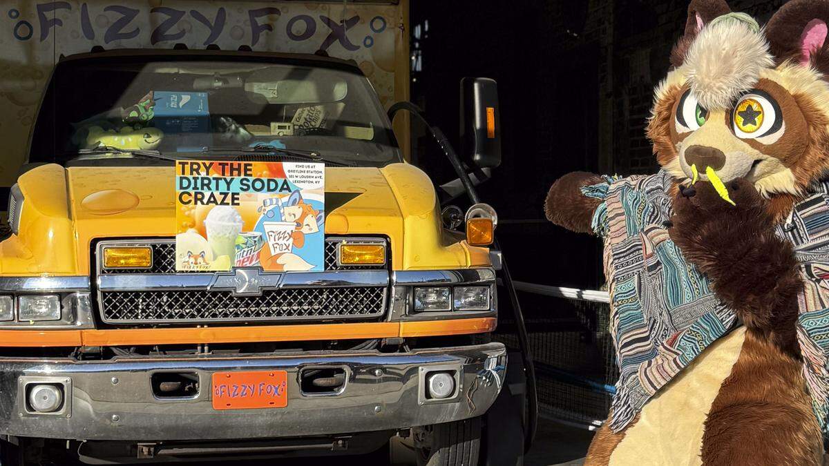 Khajiit Kitty, a popular local furry in front of the Fizzy Fox soda truck inside Lexington’s Greyline Station. The dirty soda truck is expanding with a new location on Southland Drive.