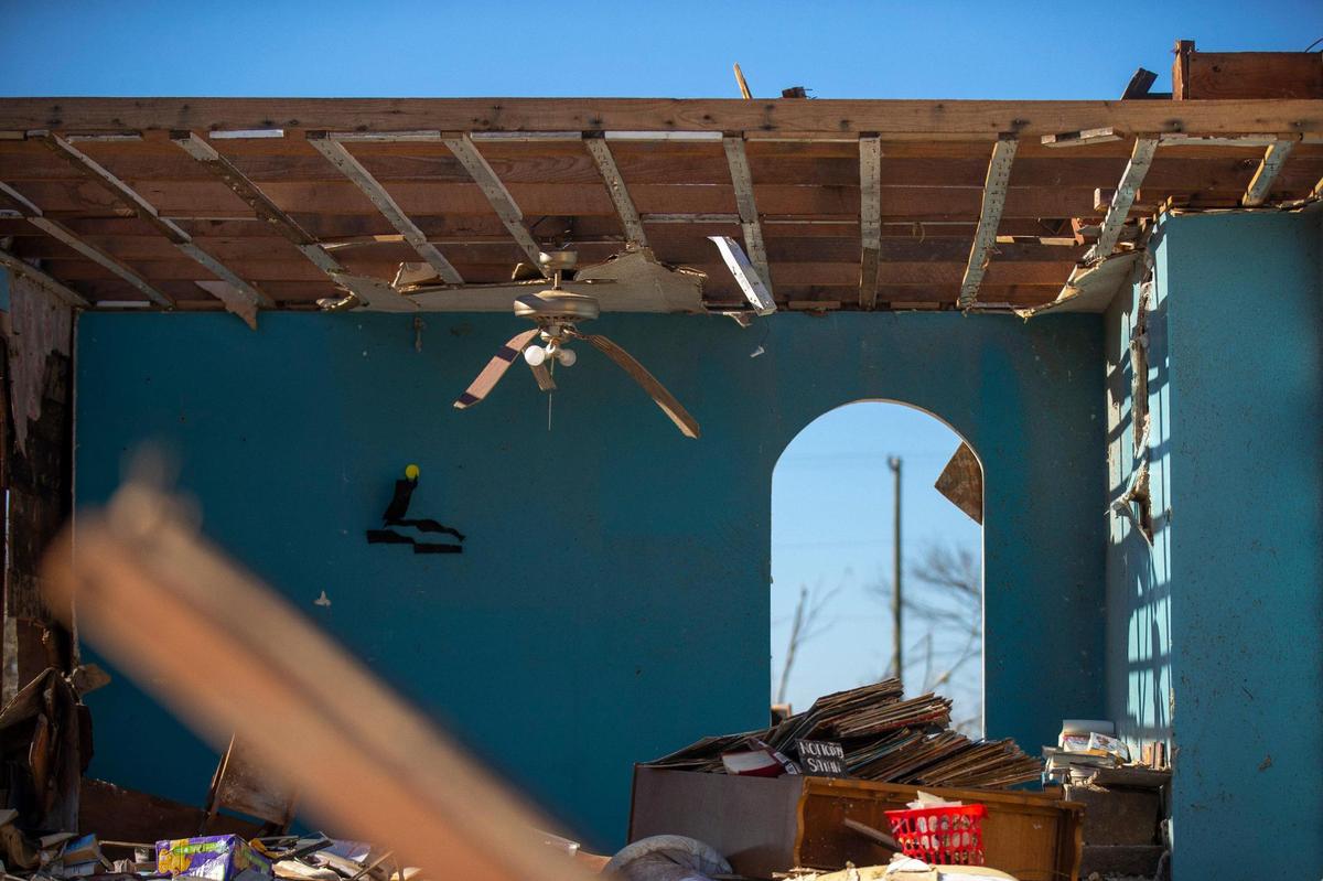 A home in Dawson Springs, Ky., was heavily damaged by a tornado that hit the community on Friday, Dec. 10, 2021.