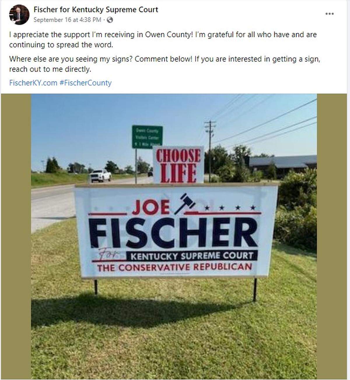 A screenshot of a Facebook post from the Fischer campaign’s Facebook page, including a photo of a “choose life” sign attached to Fischer’s.