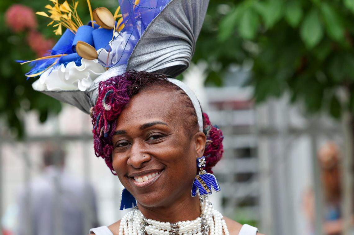 Kesha Johnson wore a blue, gold and silver hat from a Nigerian milliner during Kentucky Derby 151 at Churchill Downs May 3, 2025.&nbsp;&nbsp;