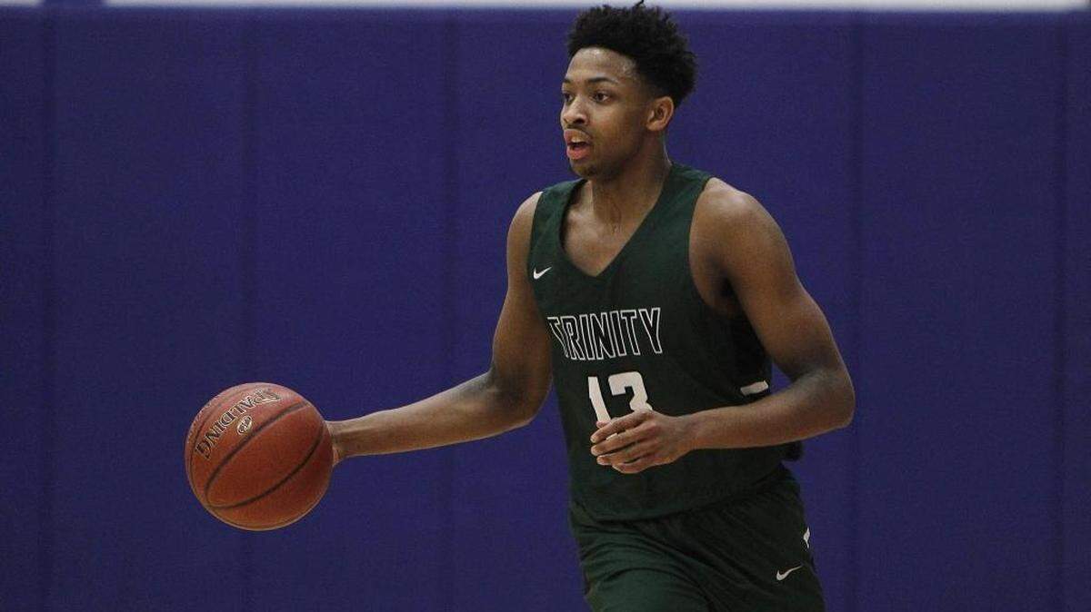 Trinity’s David Johnson ran the point against Madison Central in Richmond on Jan. 26.