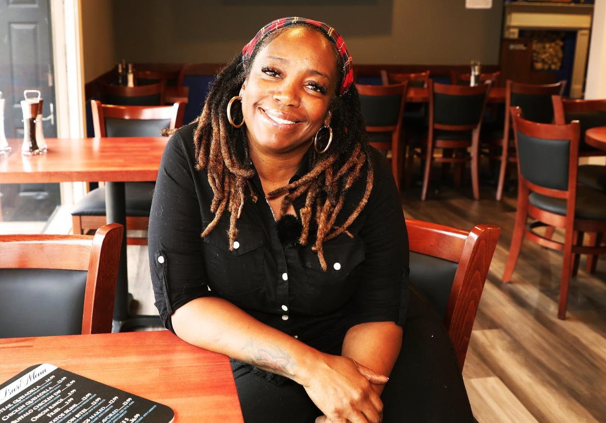 Owner Sabrina Booker opened Sassy Bleu Fine Southern Dining, a new upscale soul food restaurant on the corner of Woodland and High in Lexington.