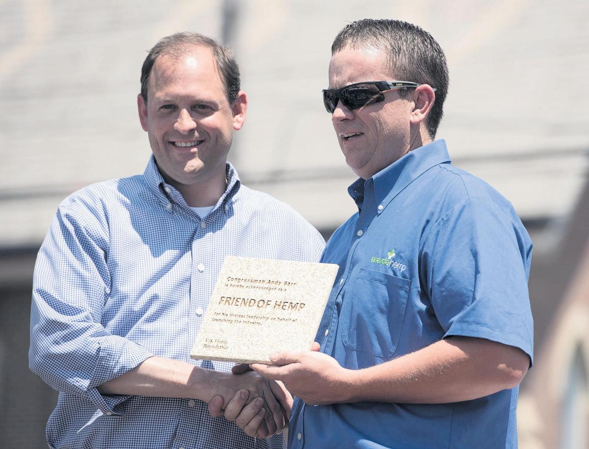 U.S. Rep. Andy Barr, R-Lexington, was awarded the 'Friend of Hemp' award by Brian Furnish, president of the U.S. Hemp Roundtable, during the Kentucky Hemp Days festival in Cynthiana for Barr's work to help hemp companies have access to the banking system. Awards were also presented to U.S. Rep. Thomas Massie, R-Vanceburg, Kentucky House Minority Leader Rocky Adkins, former Kentucky Rep. Tom McKee and Kentucky Agriculture Commissioner Ryan Quarles.