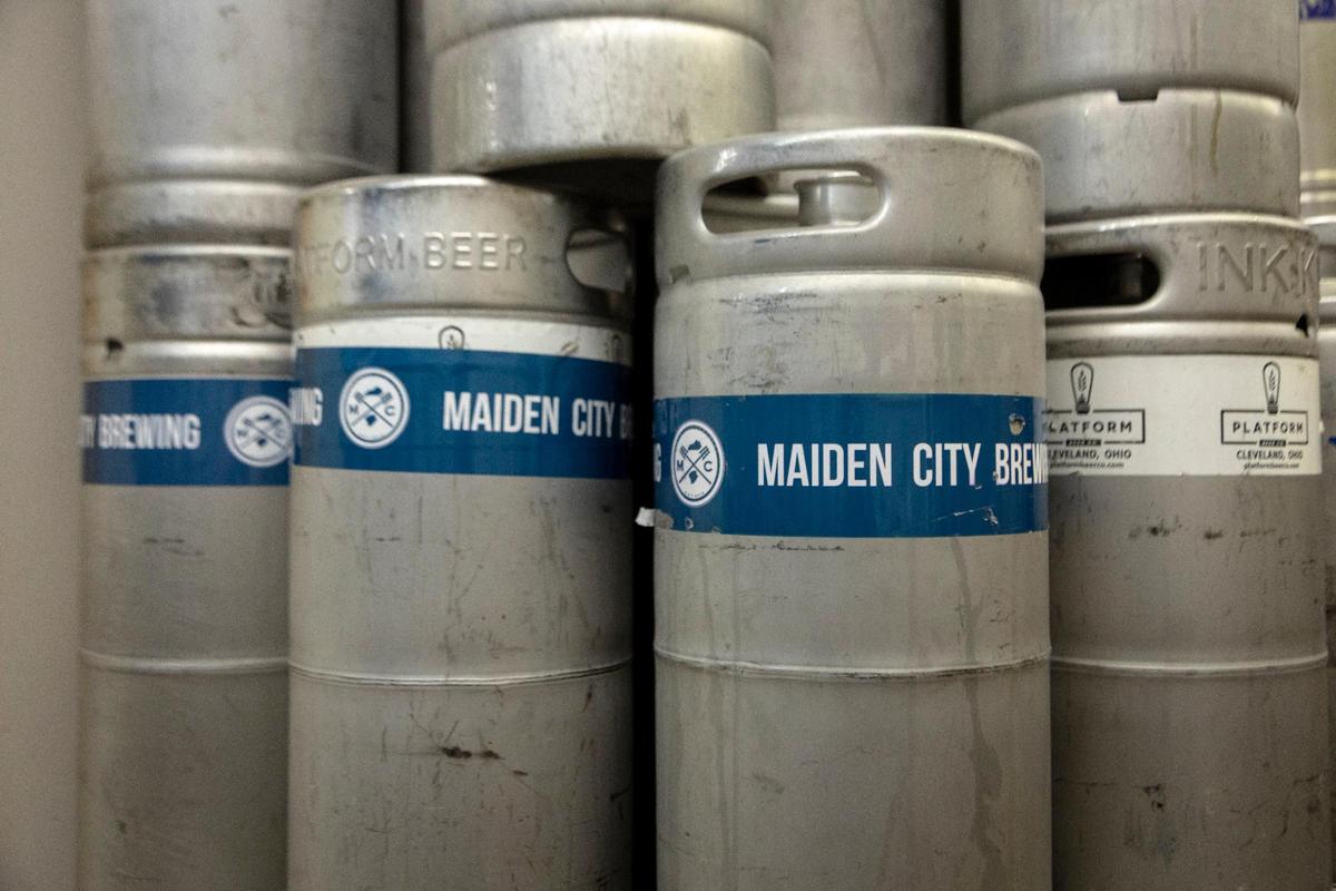 Kegs from Maiden City brewery in the workroom of the main bar. With the expansion, the brewery will be able to ship to restaurants and bars.