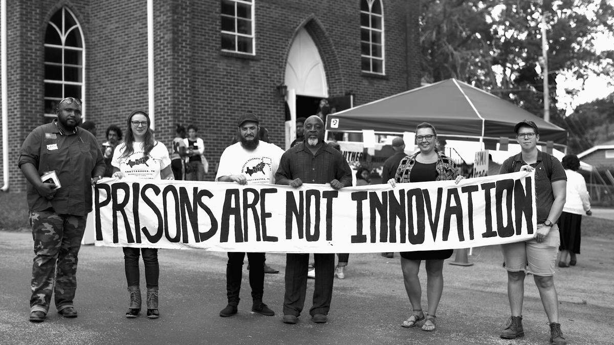 Chattanooga, Tennessee: Young folks from Appalachia in solidarity with communities at the Southern Movement Assembly fighting for prison abolition. This is not the Appalachian apathy and isolation readers of Hillbilly Elegy might expect; this is young people working with people across geographic boundaries to fight a $444 million federal prison in eastern Kentucky because we know that our communities deserve better and we know that a just future for Appalachia doesn’t look like supporting the prison- industrial complex. This photo appears in ‘Appalachian Reckoning: A Region Responds to Hillbilly Elegy.’