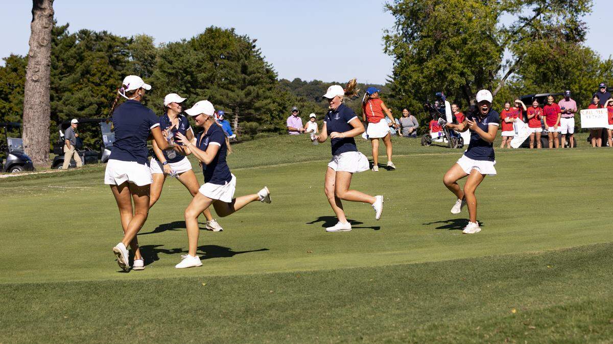Sacred Heart’s Keira Yun, right, gets showered with water by her teammates as they celebrated Yun’s win at the Leachman Buick-GMC-Cadillac/KHSAA Girls State Golf Championship at Bowling Green Country Club in Bowling Green on Wednesday.