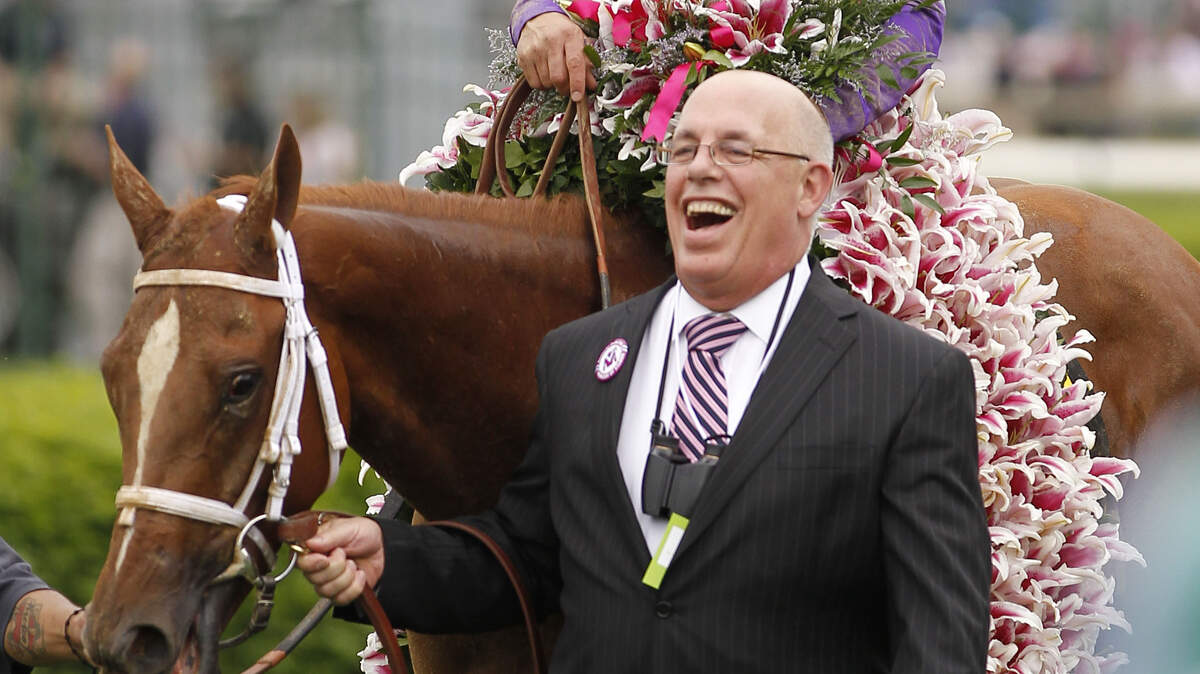 Owner Ed Stanco was in a giddy mood as he led Princess of Sylmar and Mike Smith to the winner's circle.