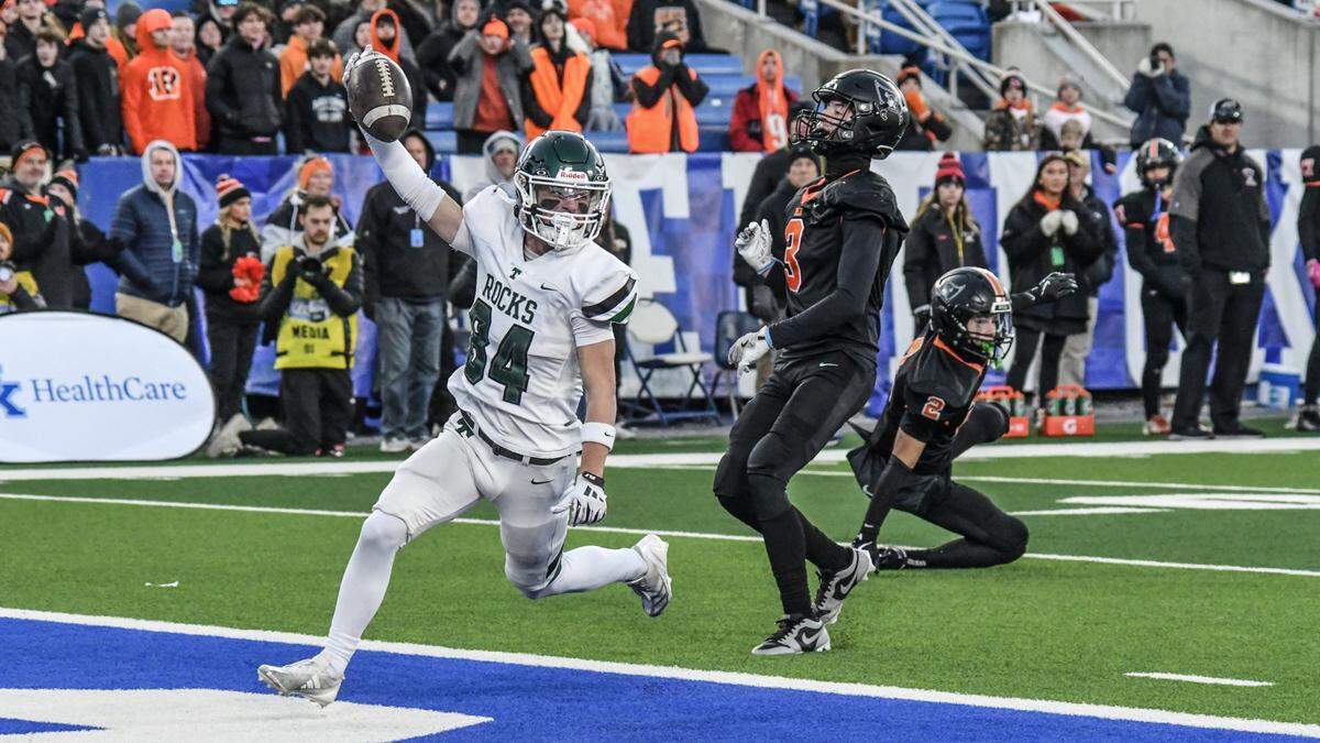 Trinity wide receiver Mason Scherer scores on a 30-yard pass from Zane Johnson during the second quarter at Kroger Field on Saturday night.