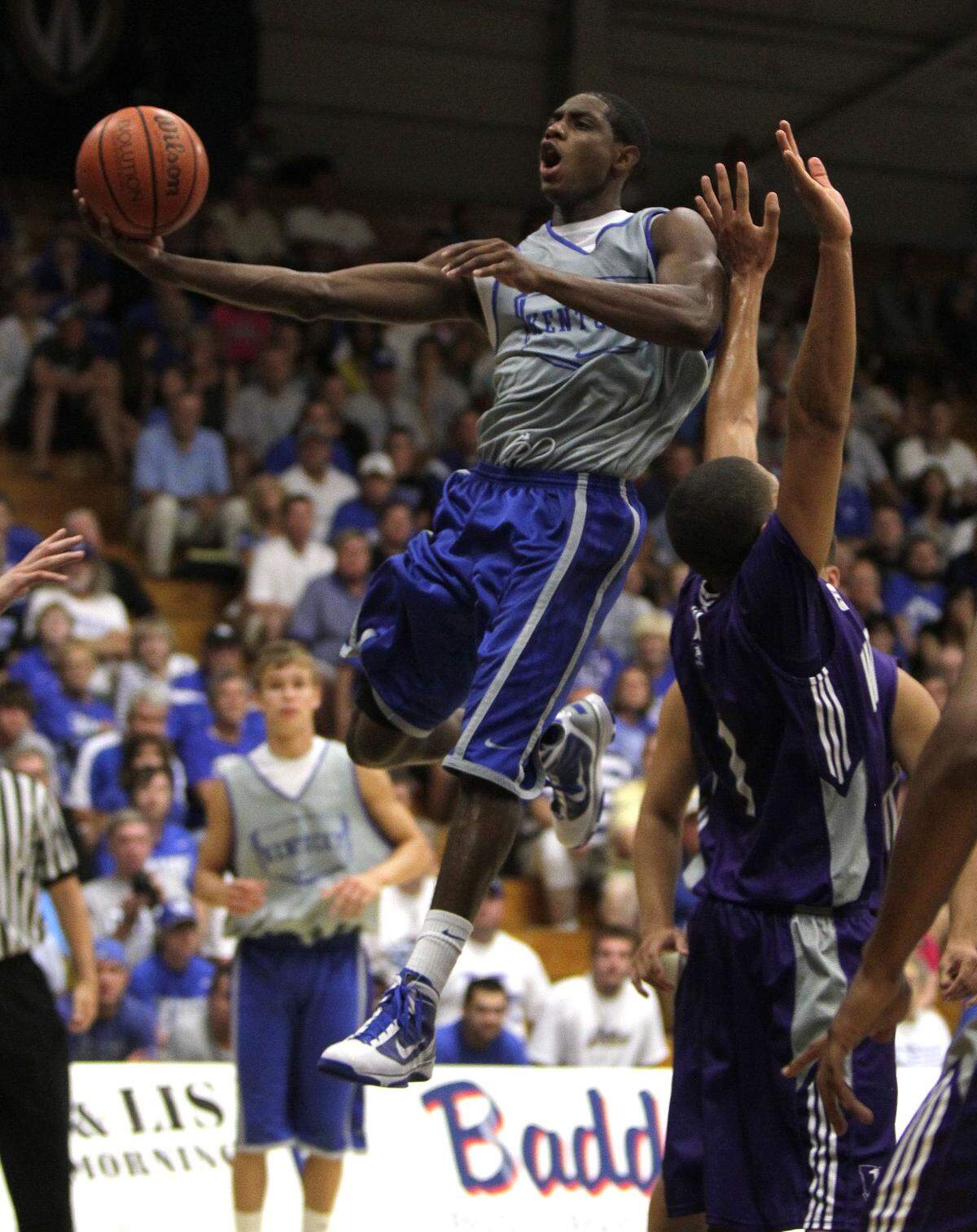 Kentucky’s Brandon Knight soared through the Western Ontario defense for two of his 17 points as UK won an exhibition game in Windsor, Ontario, Canada on Aug. 16, 2010.