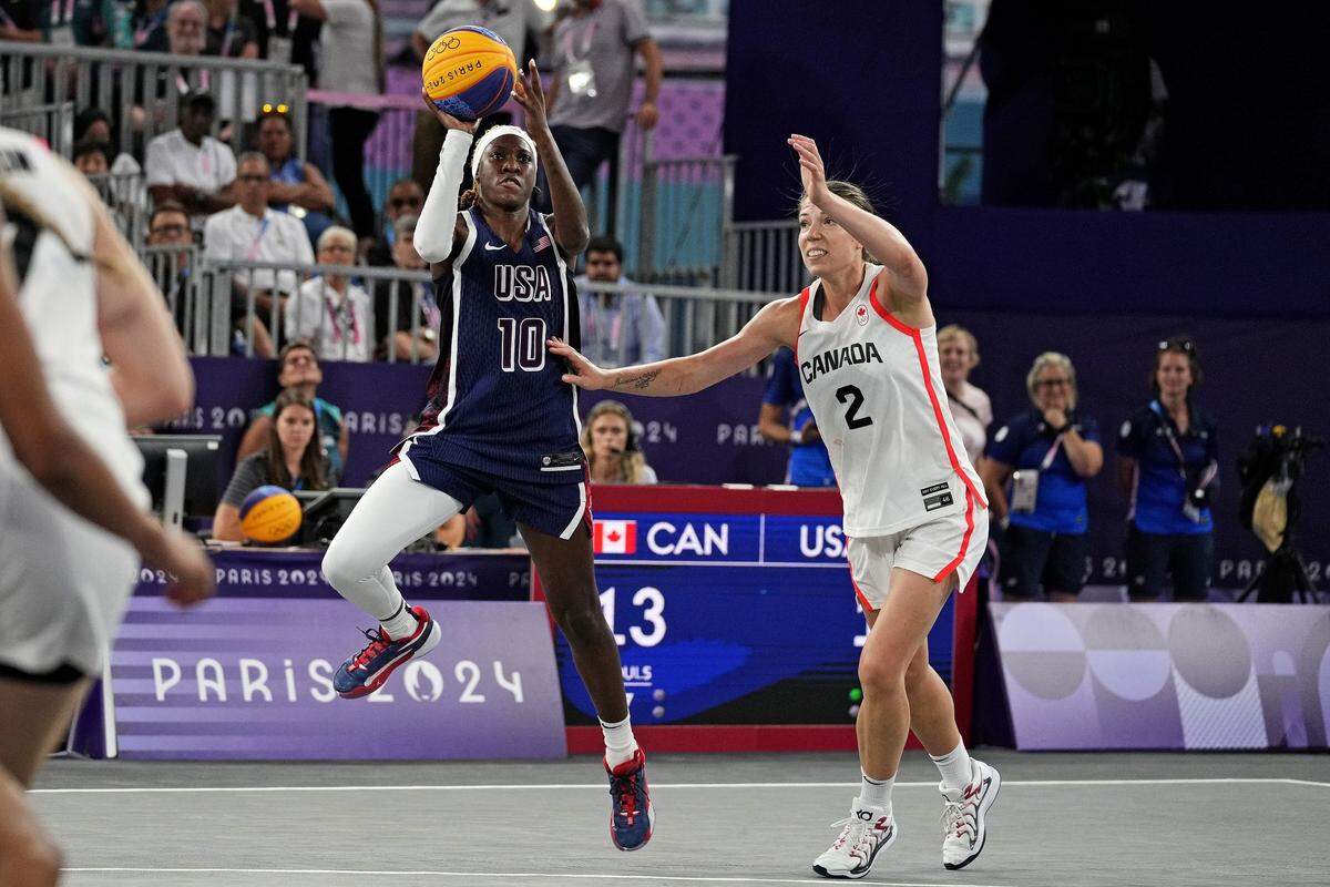 Former Kentucky star Rhyne Howard (10) shot the ball against Canada’s Katherine Plouffe (2) in the women’s 3-on-3 basketball bronze medal game during the Paris 2024 Olympic Summer Games.