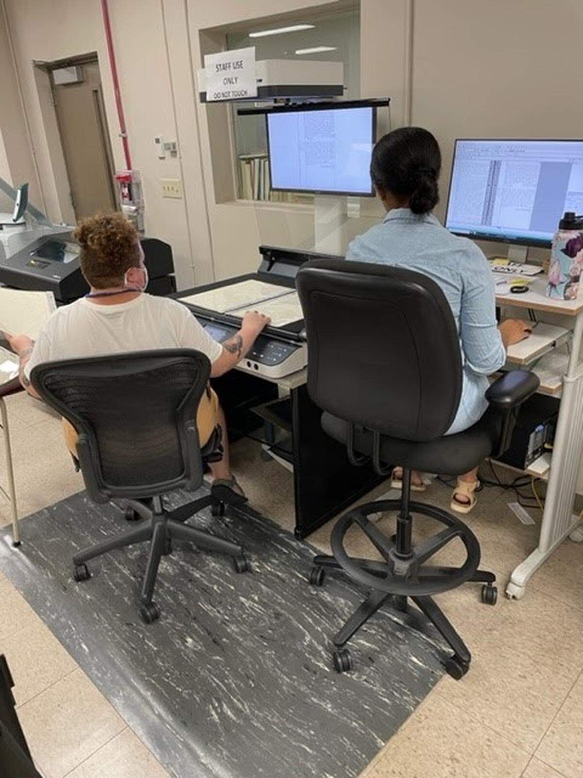 Interns for the Digital Access Project work to digitize records from the Fayette County Clerk’s office. The project took Lexington’s earliest paper records and made them available online.
