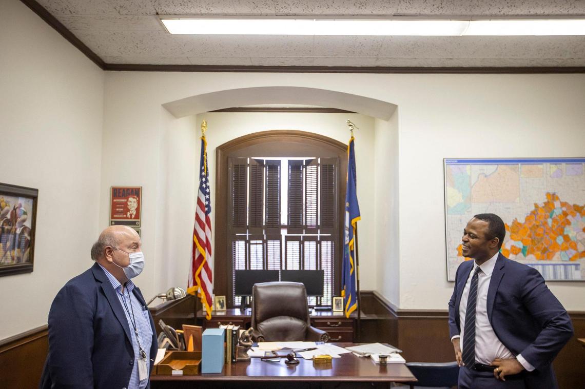 Longtime Lexington Herald-Leader Capitol Bureau Chief Jack Brammer says goodbye to Kentucky Attorney General Daniel Cameron on Brammer’s last day at the Kentucky state Capitol in Frankfort, Ky., on Wednesday, Dec. 29, 2021.