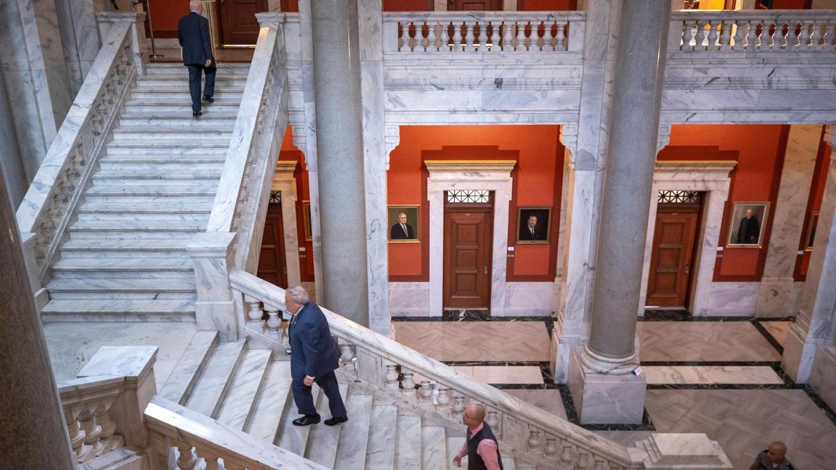 Kentucky Senate President Robert Stivers, R-Marchester, second from left, walks up stairs during a special session of the state General Assembly, called by the governor to address massive flood damage in Eastern Kentucky, at the Kentucky state Capitol on Friday, Aug. 26, 2022.