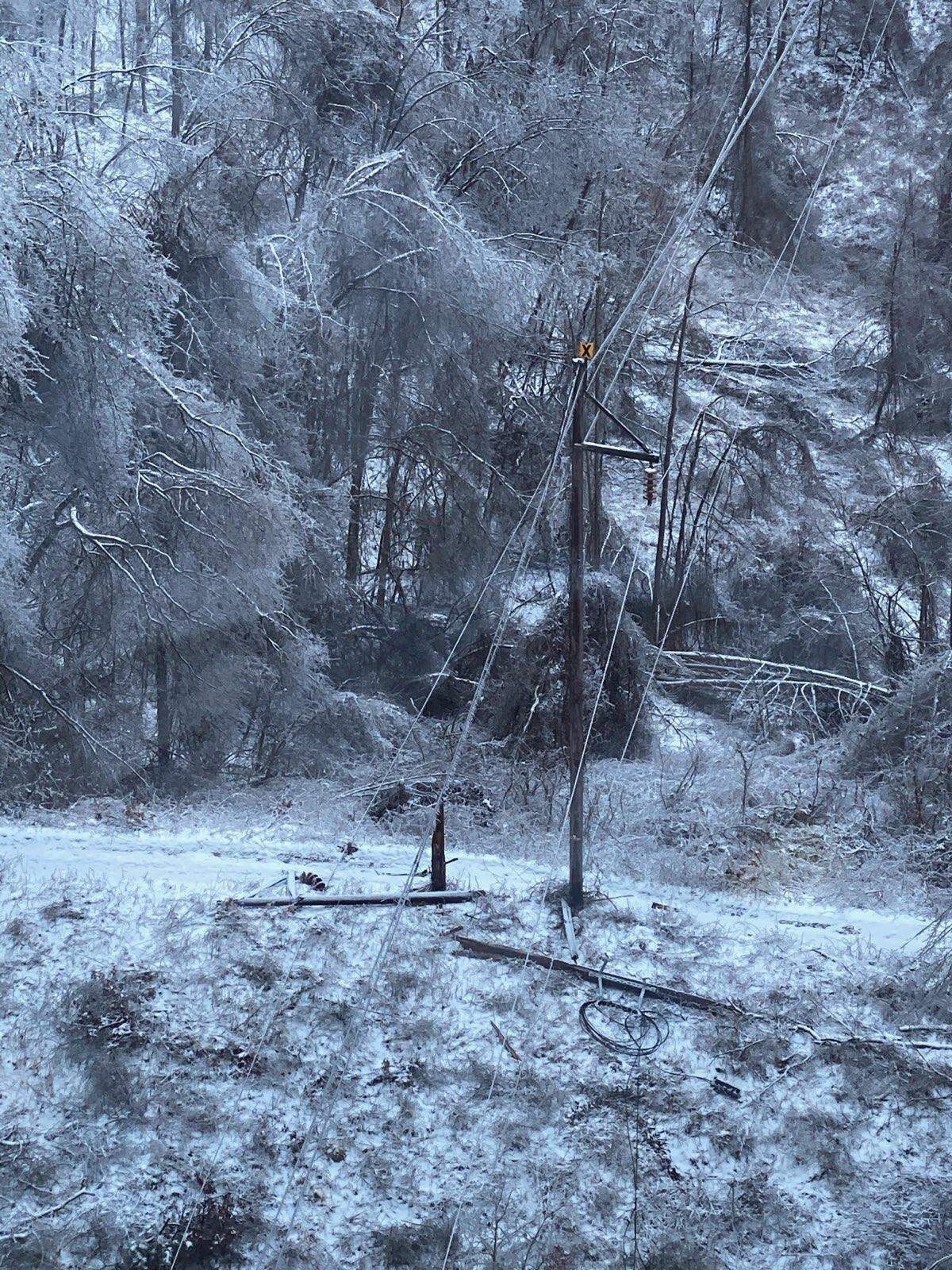 Kentucky Power crews evaluate a large transmission line at South Neal-West Huntington.