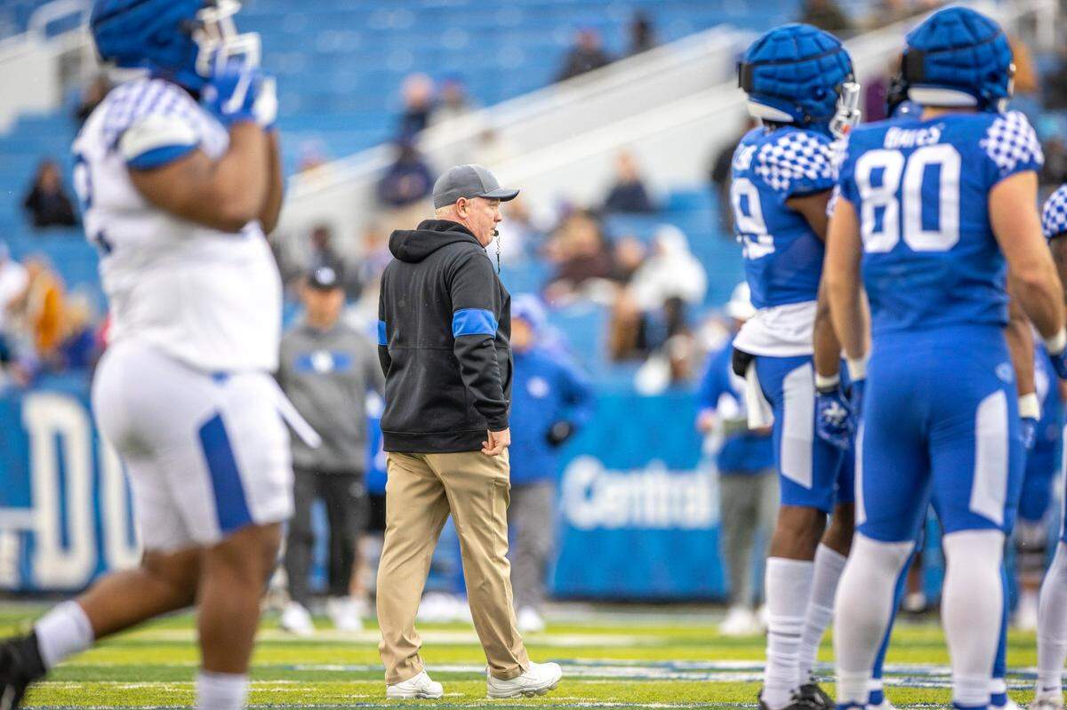 Kentucky head coach Mark Stoops watches his team during Saturday’s Blue-White Spring Game at Kroger Field.