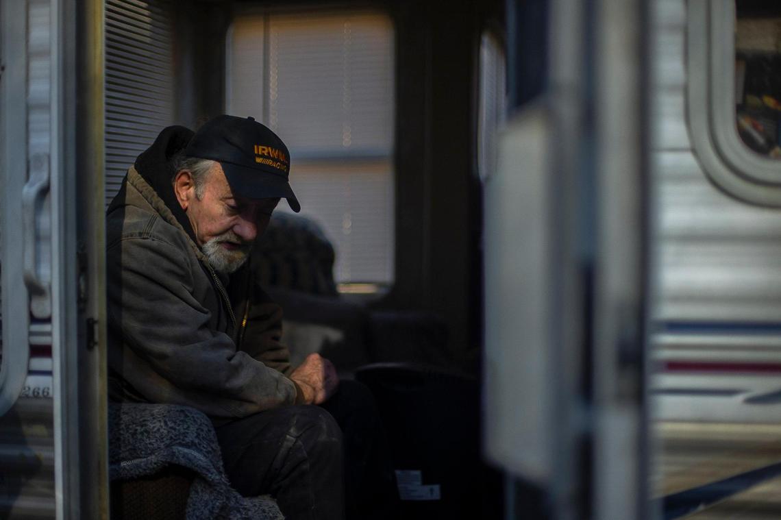 Jack Alsept sits in the travel trailer he lives in with his wife, Sherry, on Monday, Feb. 6, 2023. Their home, near Lost Creek in Eastern Kentucky, was flooded last summer and is no longer inhabitable.