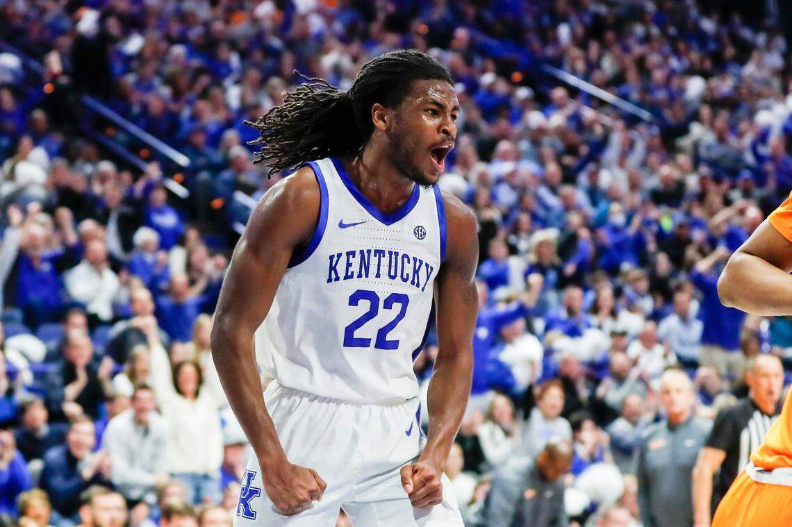Kentucky guard Cason Wallace (22) celebrates scoring against Tennessee during the first half of Saturday’s game at Rupp Arena.