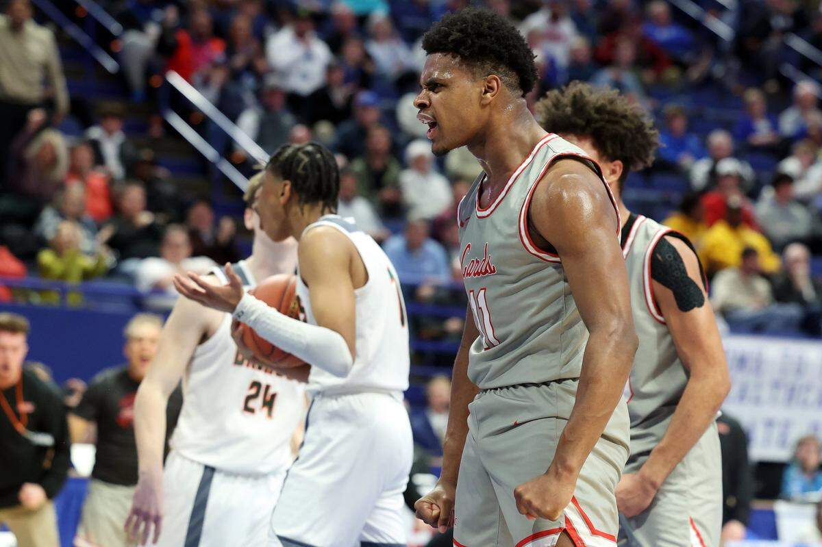 George Rogers Clark’s Jerone Morton (11) celebrates a made shot during the Sweet 16 semifinals against Frederick Douglass at Rupp Arena on Saturday.