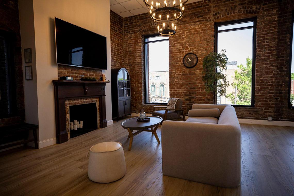 This short-term rental overlooks the Lexington Opera House across Broadway.