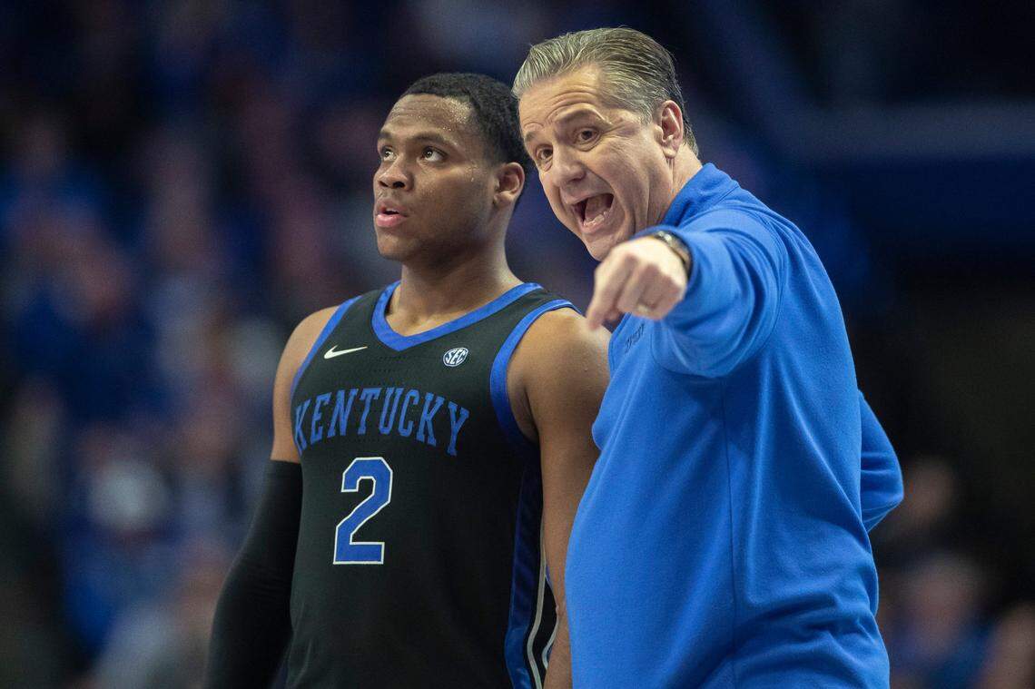 Kentucky head coach John Calipari speaks to Sahvir Wheeler during a recent game. The Wildcats are 8-3 entering conference play on Wednesday night.