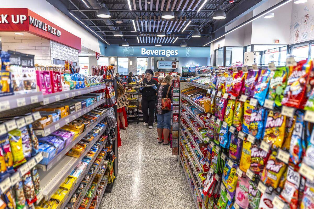 Wawa employees hand out samples of food and drinks during an event for VIP customers at the company's first Central Kentucky location at 3000 Lexington Road in Nicholasville, Ky., on Wednesday, Sept. 10, 2025. The location is scheduled to open Friday.