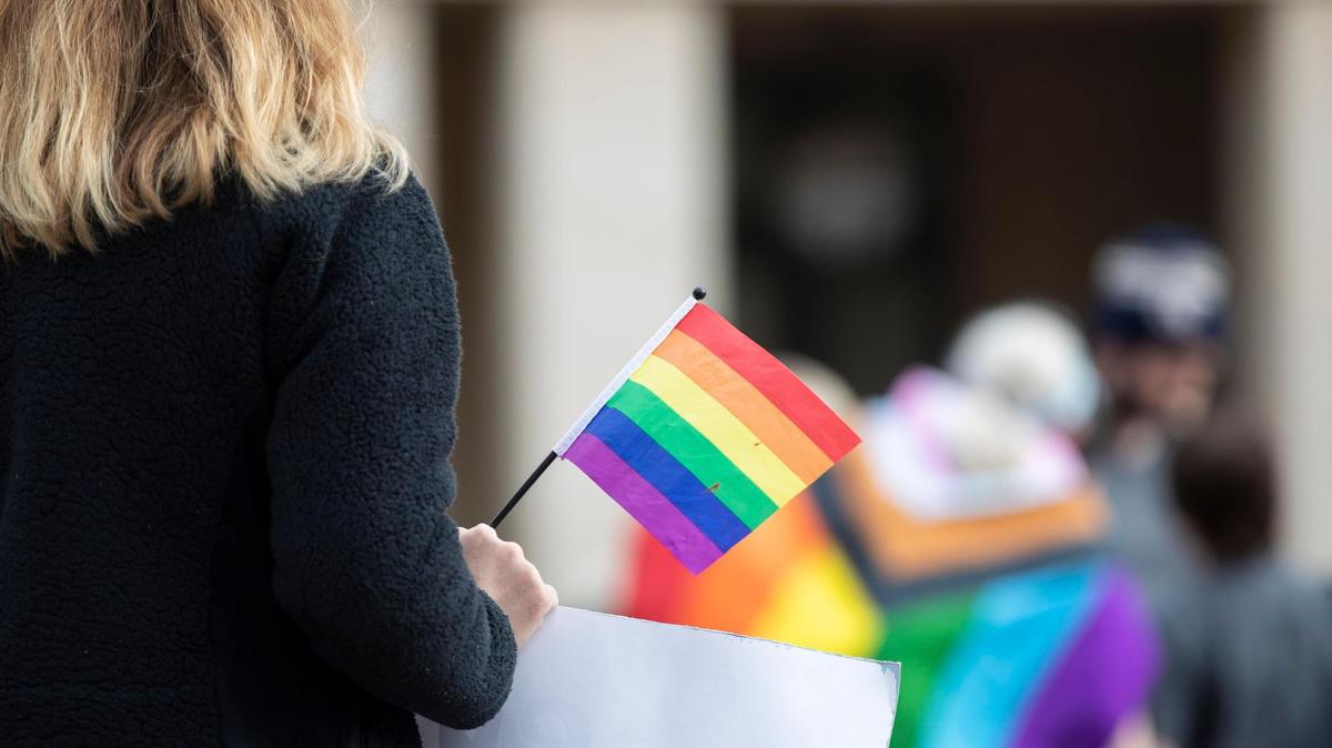 People gather for a rally organized by LGBTQ youth and adults in opposition to Senate Bill 150 and also to celebrate Trans Day of Visibility in Lexington, Ky., Friday, March 31, 2022.