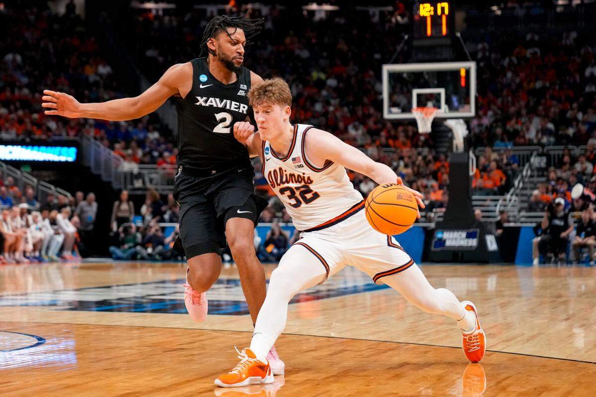 Illinois freshman guard Kasparas Jakucionis (32) just missed a triple-double in the Fighting Illini’s 86-73 win over Xavier in the NCAA Tournament round of 64, finishing with 16 points, nine rebounds and 10 assists.