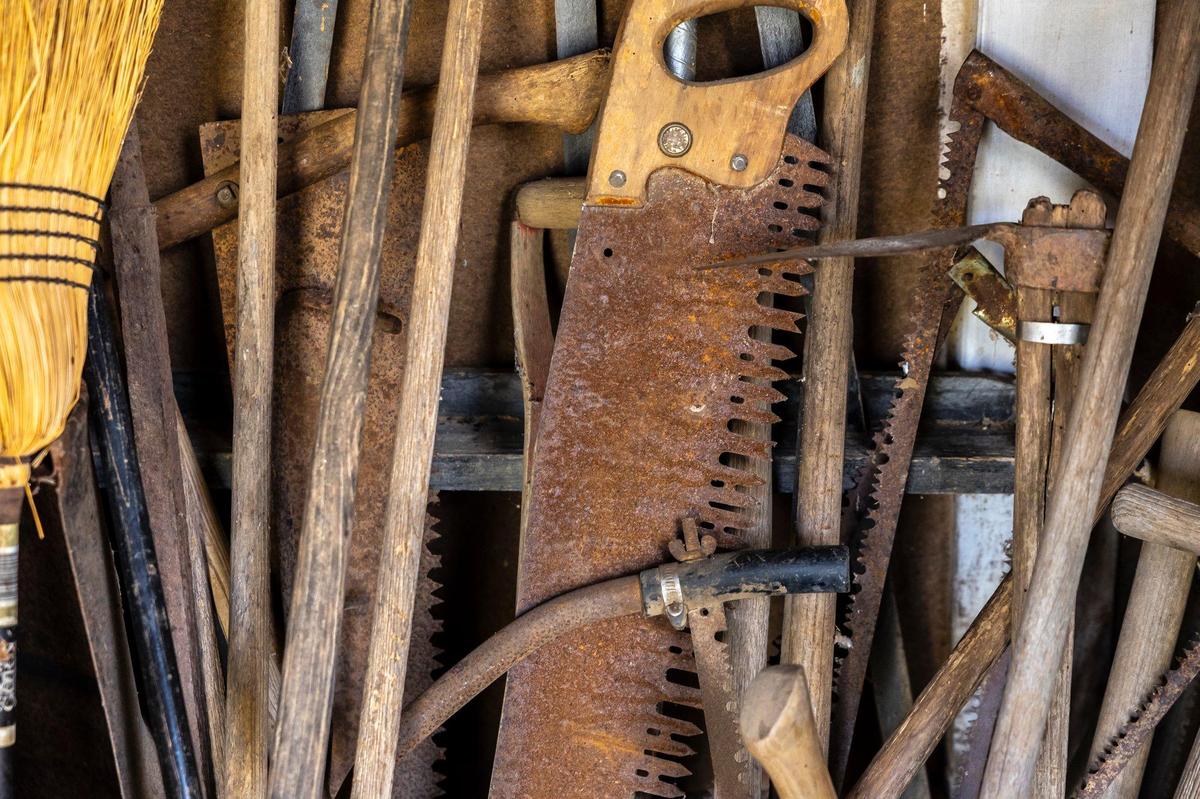 Tools and scrap pieces of lumber are stored in the studio at Payne Hollow In Trimble County, Ky., on Thursday, March 6, 2025. Harlan and Anna Hubbard lived off their land in a very remote and sustainable way for about 40 years at Payne Hollow.