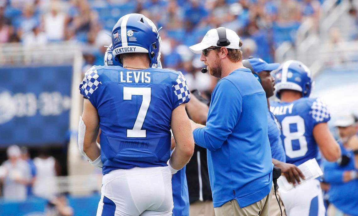 In the first year with offensive coordinator Liam Coen, right, calling the plays and Will Levis (7) starting at quarterback, the Kentucky offense improved by almost every significant metric.