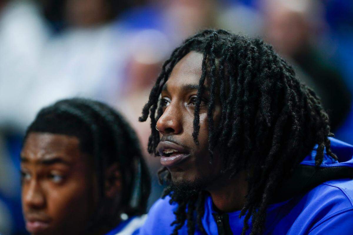 Kentucky freshman Aaron Bradshaw watches his UK teammates play against Marshall on Friday night.