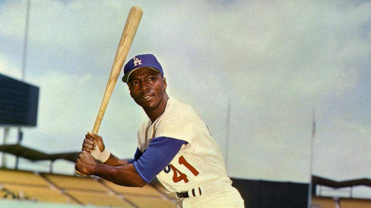 During his eight years in the major leagues, Lou Johnson had a career average of .258 with 48 home runs.