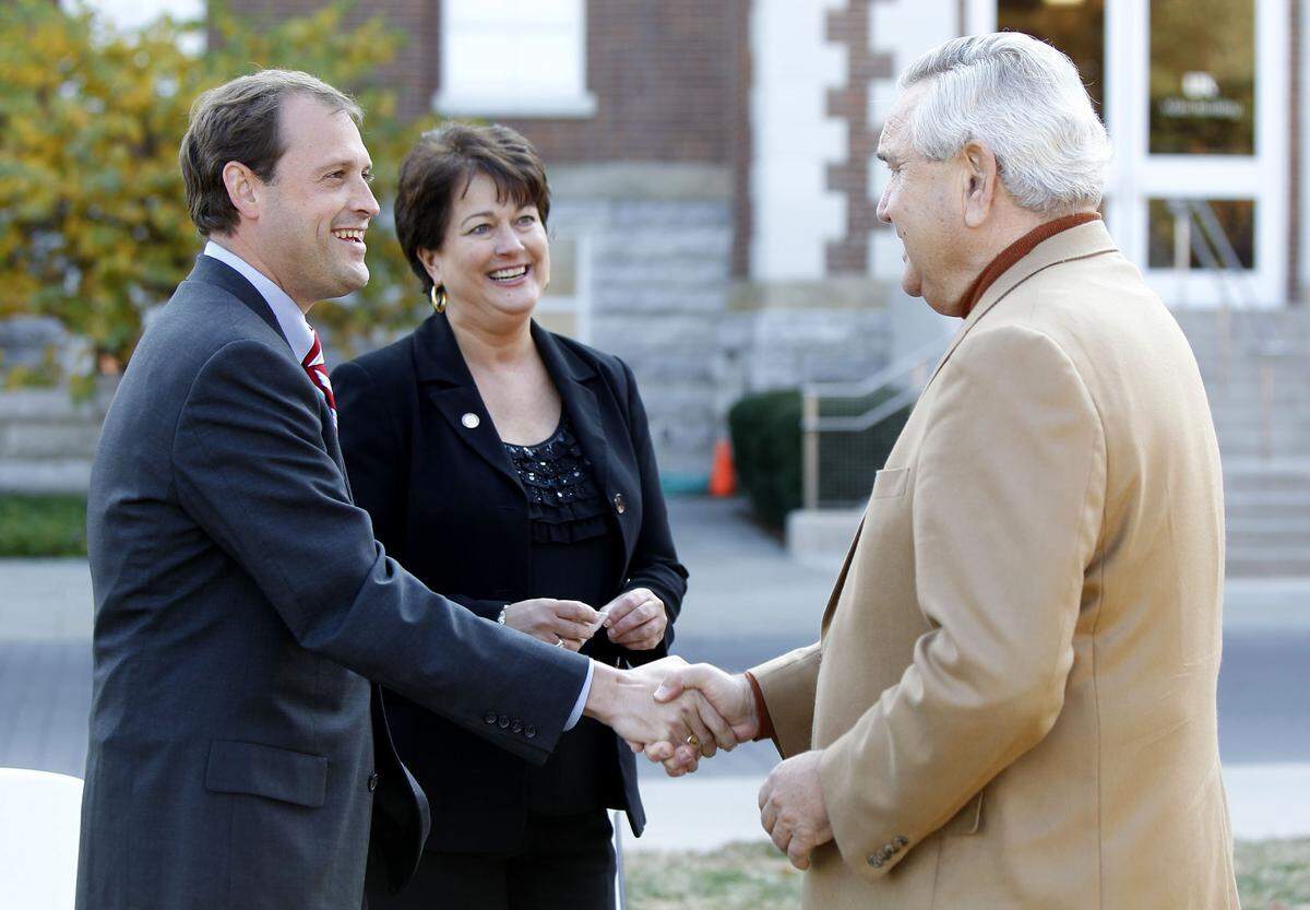 6th District house candidate, Andy Barr, republican, was greeted by Larry Forgy and Alice Forgy Kerr, center, before he spoke outside the UK Administration building on Friday October 29, 2010 in Lexington, Ky. Photo by Mark Cornelison | Staff