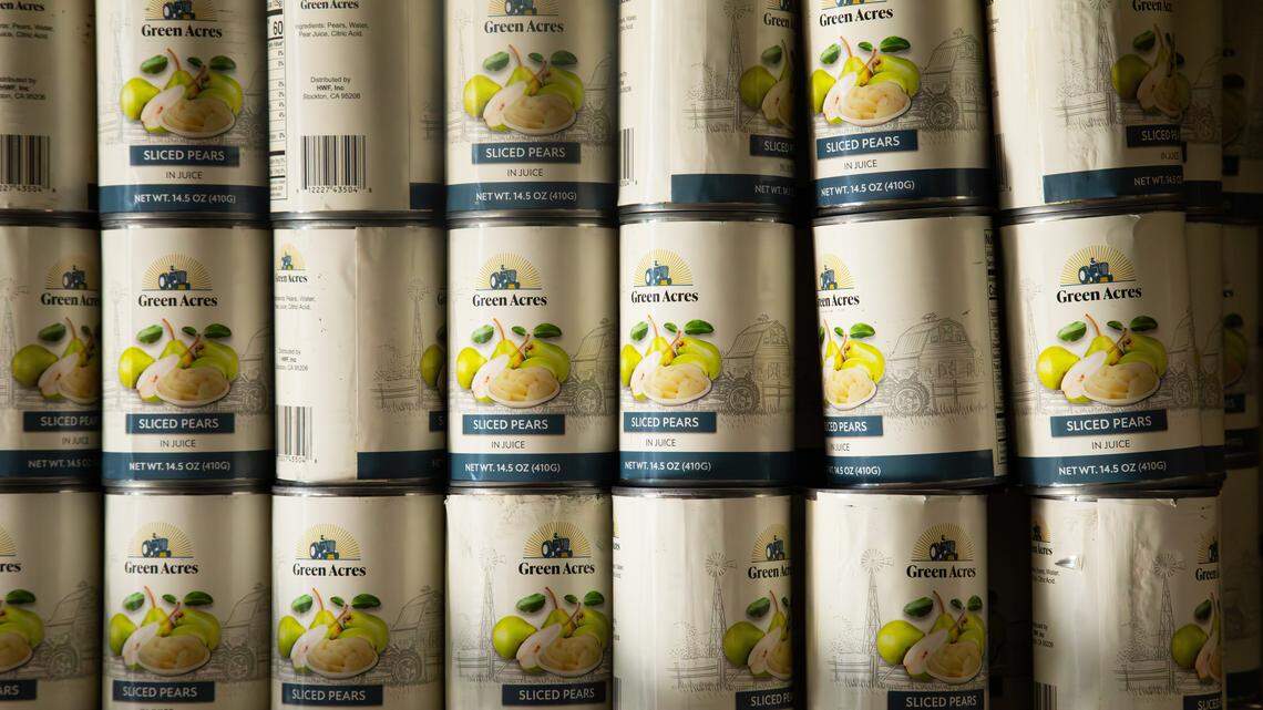 Sliced pears are among the canned goods available to food recipients at the God's Pantry Food Bank Volunteer Center on Nov. 3, 2025, at 817 Winchester Road in Lexington, Ky.
