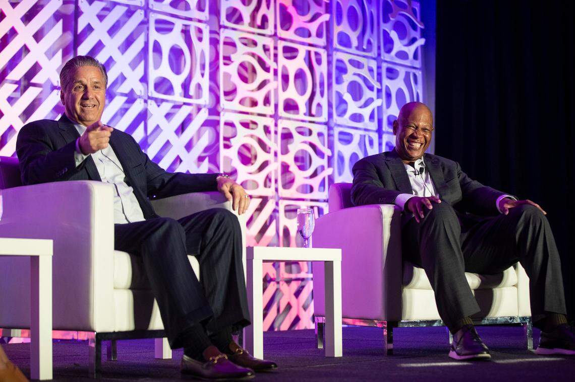 Kentucky men’s coach John Calipari talks with Louisville men’s coach Kenny Payne during the The Kentucky Chamber Annual Dinner in Louisville before last season.