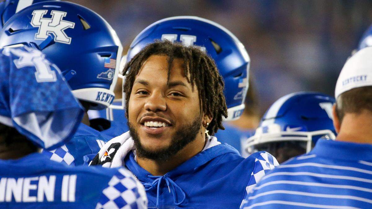 Kentucky running back Christopher Rodriguez was on the sidelines for the team’s 31-23 victory over Northern Illinois Saturday night at Kroger Field.
