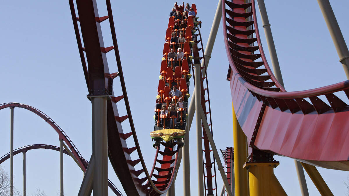 Guests rode on the Diamondback roller coaster during a VIP preview, Friday, April 17, 2009, at Kings Island Amusement Park in Mason, Ohio.